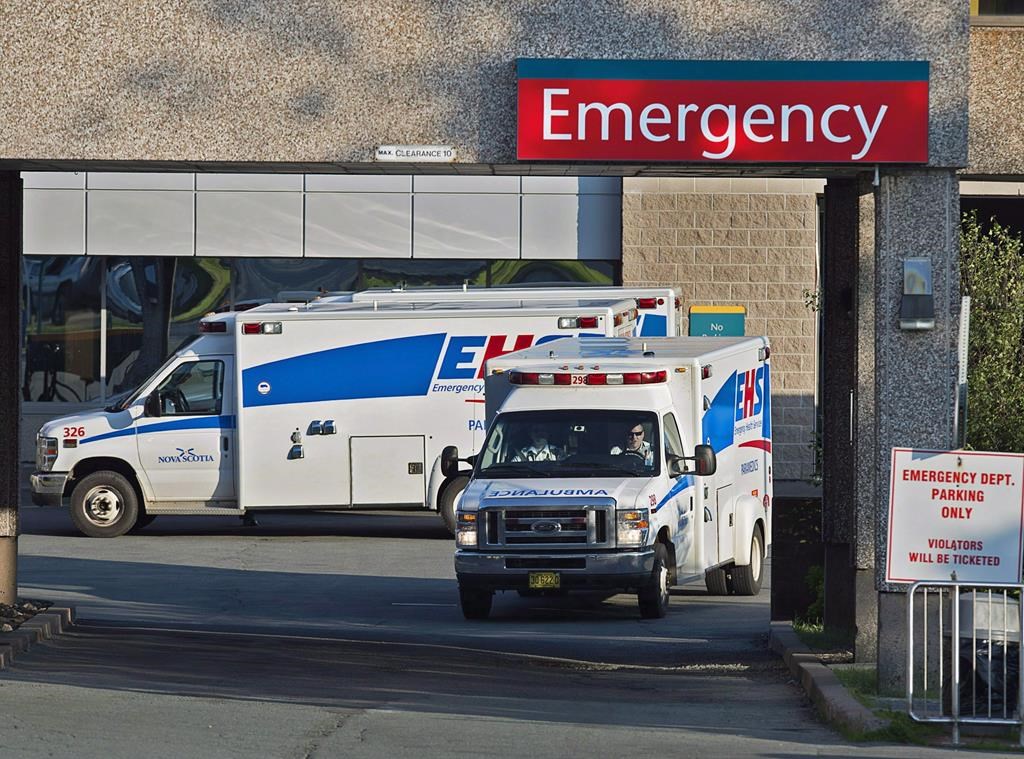 Paramedics are seen at the Dartmouth General Hospital in Dartmouth, N.S., on July 4, 2013. THE CANADIAN PRESS/Andrew Vaughan.