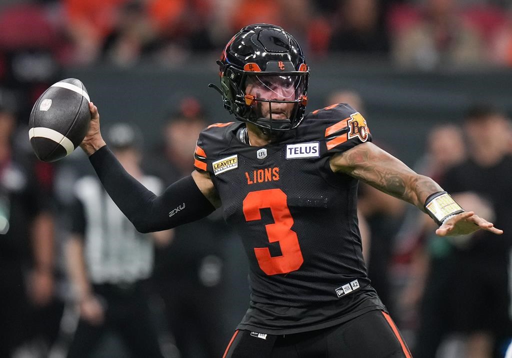 B.C. Lions quarterback Vernon Adams Jr. passes during the first half of a CFL football game against the Edmonton Elks, in Vancouver, on Thursday, June 27, 2024.