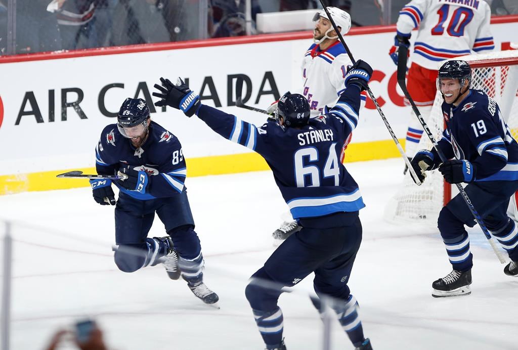 The Winnipeg Jets have signed forward David Gustafsson and defenceman Logan Stanley to two-year contract extensions. Winnipeg Jets' Sam Gagner (89), Stanley (64) and Gustafsson (19) celebrate Gagner’s goal against the New York Rangers during third period NHL action in Winnipeg, Friday, Oct. 14, 2022. THE CANADIAN PRESS/John Woods.
