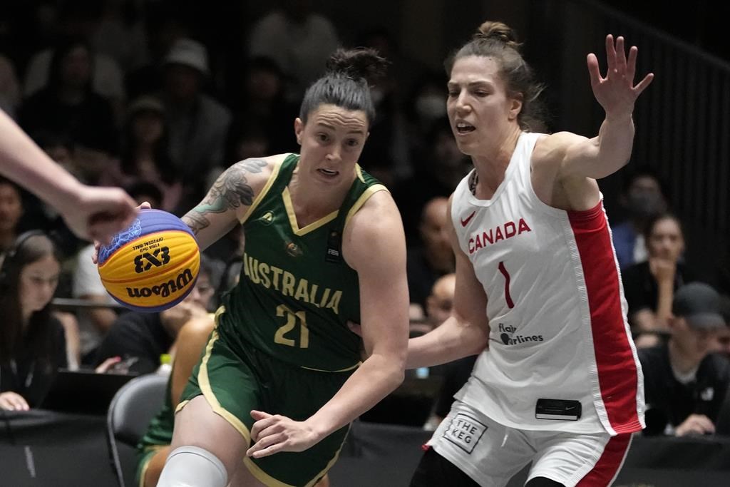 Marena Whittle of Australia, left, controls the ball against Michelle Plouffe of Canada right, during a women's 3x3 basketball final of FIBA Universality Olympic Qualifying Tournament, Sunday, May 5, 2024, in Utsunomiya, north of Tokyo, Japan. Getting to the Paris Olympics has been a humbling experience for Katherine and Michelle Plouffe.
The twin sisters not only put sweat into the journey, but their own money and countless hours as they built Canada's three-on-three basketball program from the ground up. THE CANADIAN PRESS/AP/Shuji Kajiyama.
