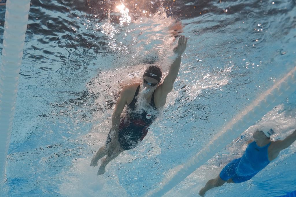 Summer McIntosh, of Canada, competes during a heat in the women's 400-metre freestyle at the 2024 Summer Olympics, Saturday, July 27, 2024, in Nanterre, France. THE CANADIAN PRESS/AP-David J. Phillip.