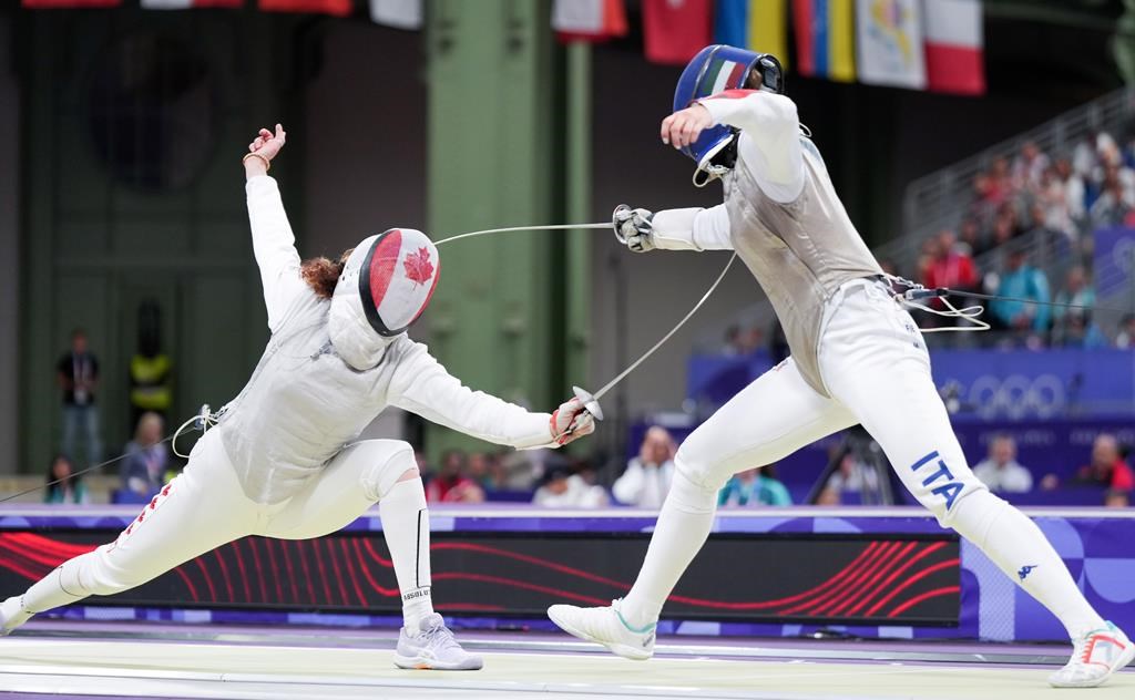 Eleanor Harvey of Canada competes against Martina Favaretto of Italy in the women's individual foil in Paris, France on Sunday, July 28, 2024. THE CANADIAN PRESS/Christinne Muschi.
