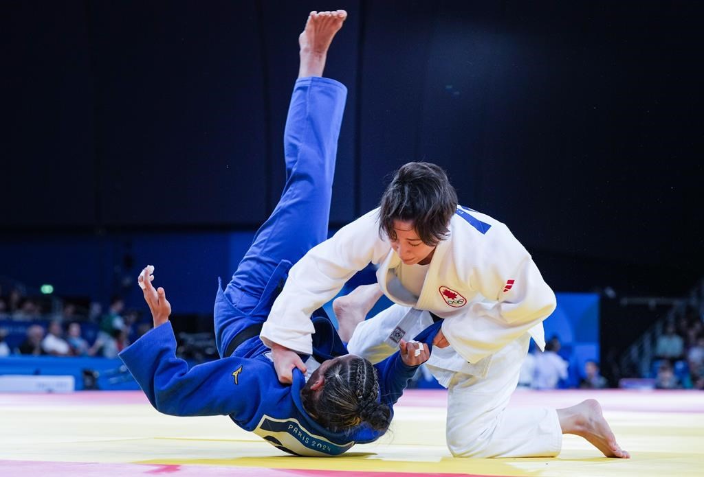 Canada's Christa Deguchi competes against Panama's Kristine Jimenez in women's -57kg judo in Paris, France on Monday, July 29, 2024. THE CANADIAN PRESS/Christinne Muschi.