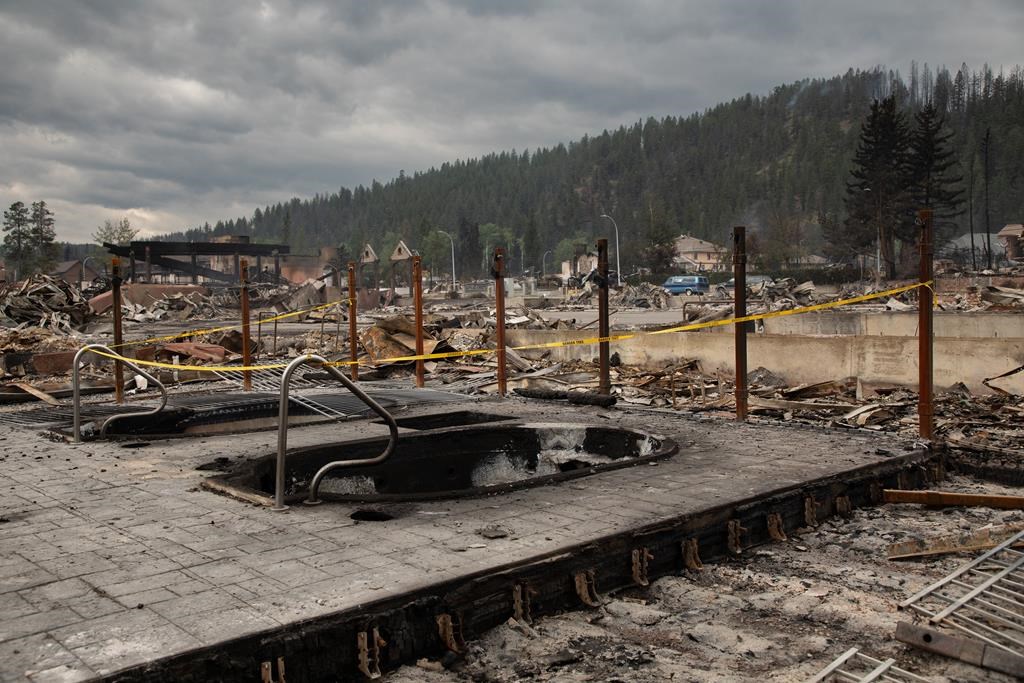 The remains of hotels in Jasper, Alta. are shown on Friday July 26, 2024. The economy of the mountain town depends overwhelmingly on tourism, particularly the crucial summer season.