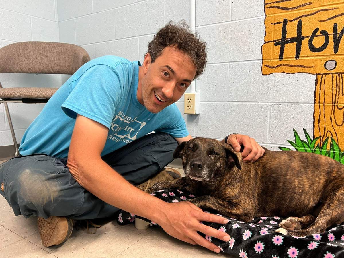 Jesse Rochette and Sparsy the dog at Giles County Animal Shelter after the resilient pup was rescued from the bottom of a 50-foot cave.