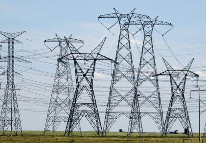 Transmission lines transport electricity to the grid from the coal-fired Sheerness Generating Station, co-owned by TransAlta and ATCO, near Sheerness, Alberta on June 15, 2016.