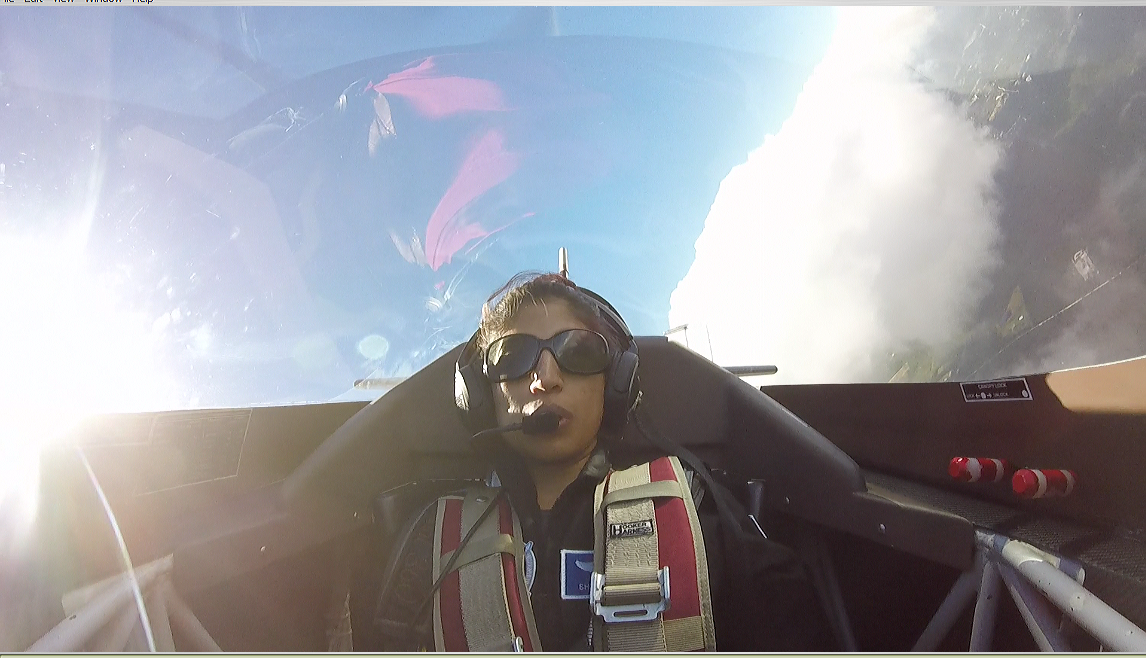 Dr. Shawna Pandya during an aerobatic flight during the Project PoSSUM 1502 ground school