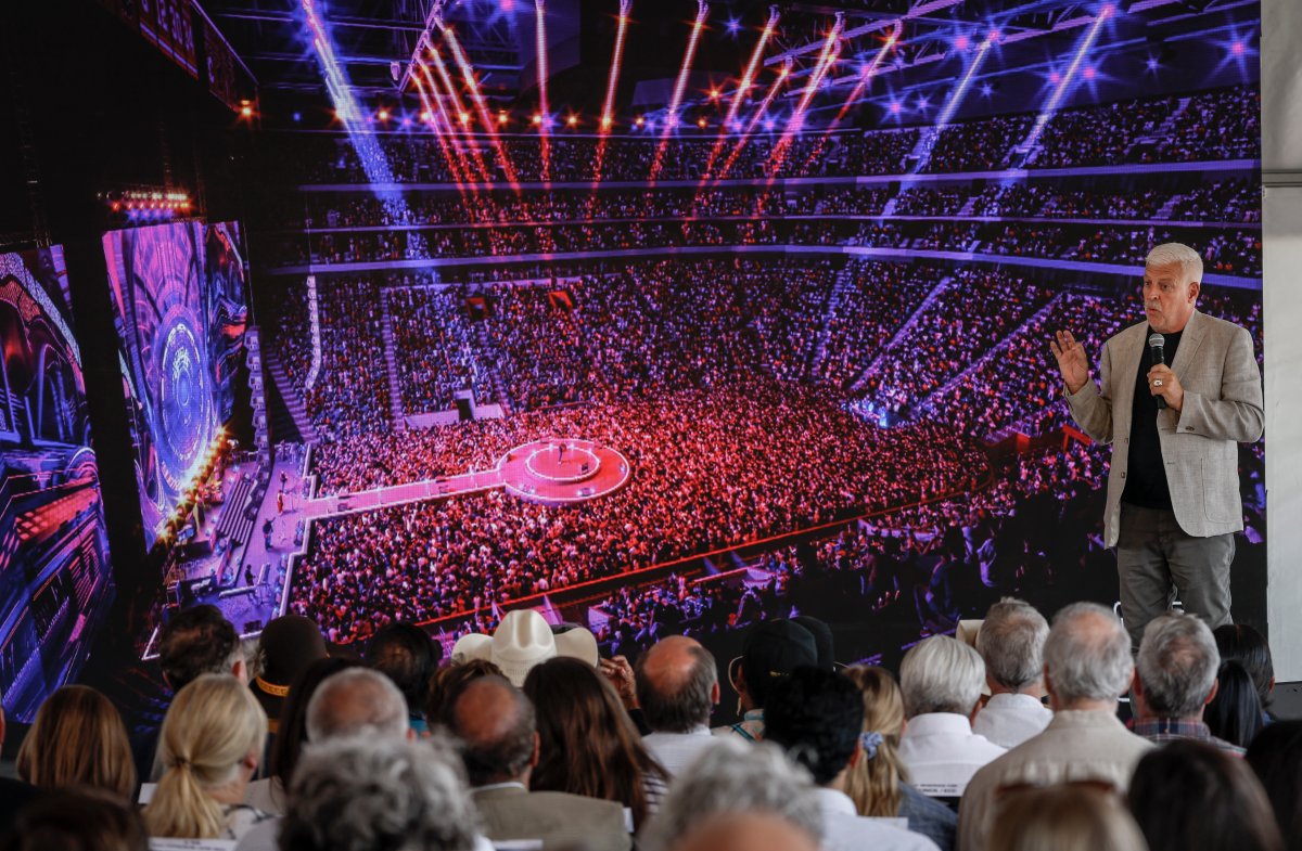 Bill Johnson, design principal with HOK, describes the concert venue setting of the new Calgary Flames arena to dignitaries at a ceremony in Calgary, Alta., Monday, July 22, 2024.