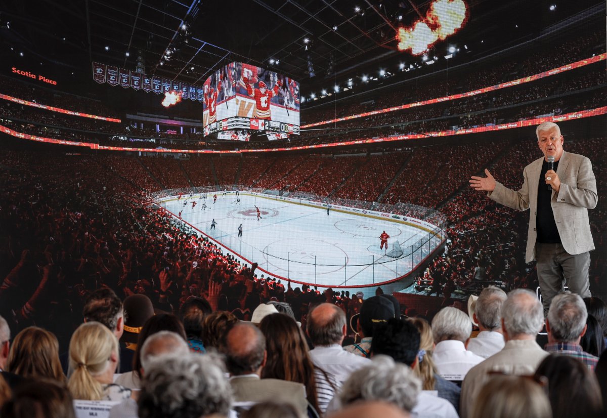 Bill Johnson, design principal with HOK, describes the hockey setting of the new Calgary Flames arena to dignitaries at a ceremony in Calgary, Alta., Monday, July 22, 2024.