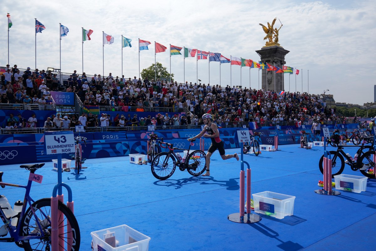 Canada's Tyler Mislawchuk competes during the men's individual triathlon competition at the 2024 Summer Olympics, Wednesday, July 31, 2024, in Paris, France. (AP Photo/Dar Yasin).