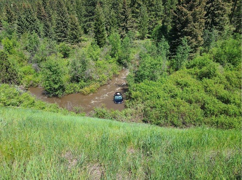 The damaged car in Hat Creek that British tourists Mark and Janet Brimicombe were rescued from.