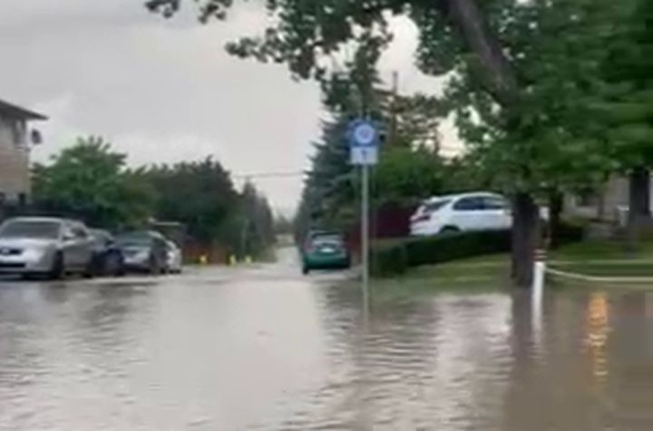 A flooded street in Calgary. That city and other parts of southern Alberta were hit by a summer storm on June 30, 2024.