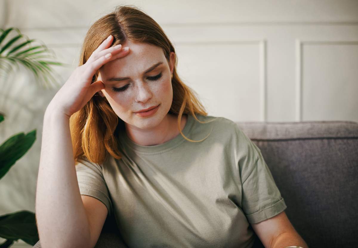 Woman with a migraine