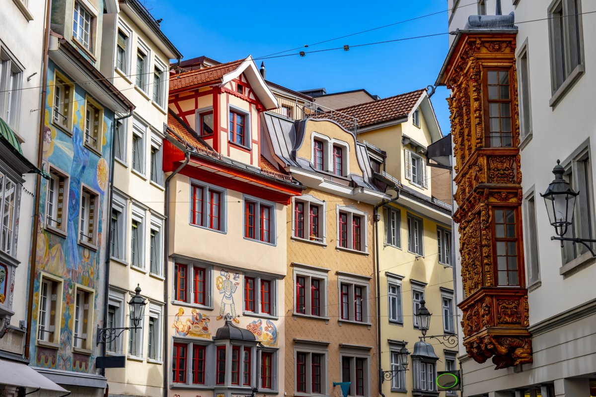 Traditional, colourful buildings on a narrow street.