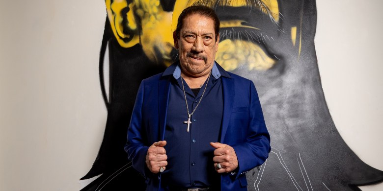 Danny Trejo throws punches, chair after water balloon hits parade car
