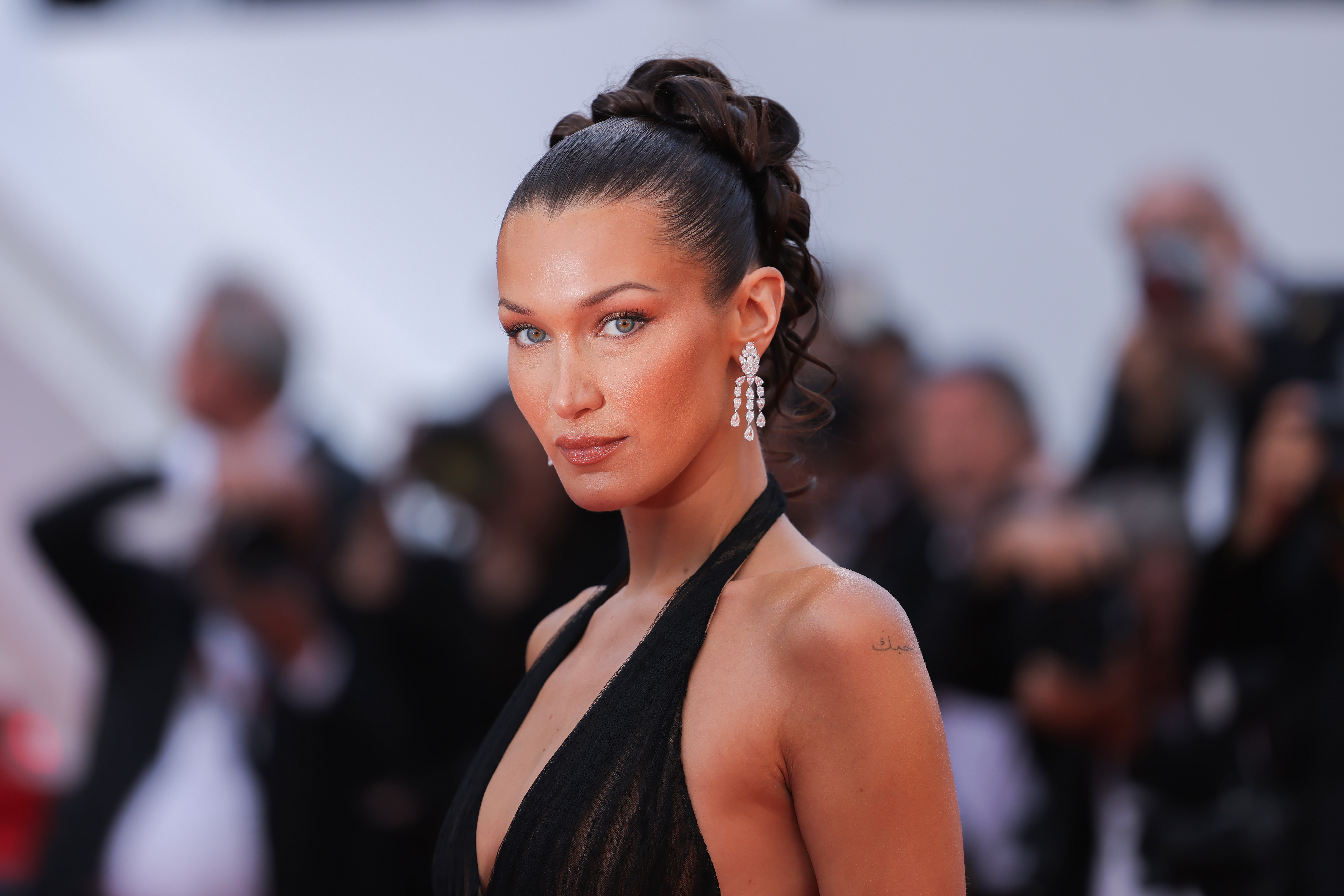 Adidas apologizes to Bella Hadid for dropping her from shoe ad criticized by Israel