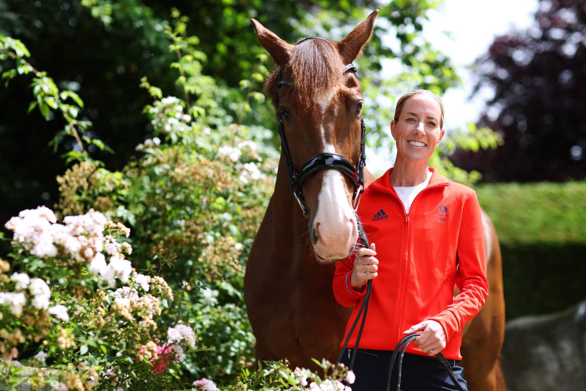 Charlotte Dujardin poses with her horse Pete (Imhotep) during a Team GB Paris 2024 Olympic Games equestrian team announcement at Oakelbrook Mill on July 02, 2024 in Newent, England. Dujardin has withdrawn from the Olympics after a video emerged showing her whipping a horse repeatedly during a training session.