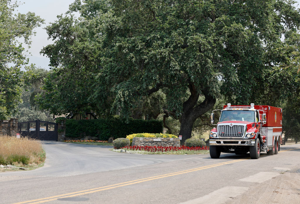A fire truck is seen near the entrance to Neverland Ranch, former home of late singer Michael Jackson, as the Lake Fire continues to burn in the Los Padres National Forest, in Los Olivos, California, on July 7, 2024.