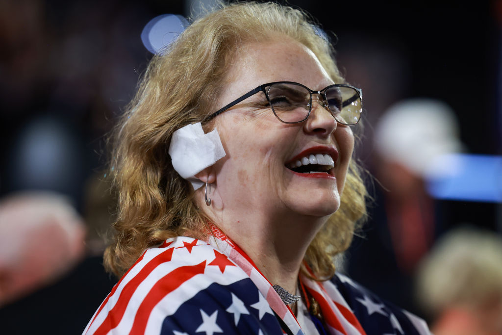 Arizona delegate Susan Ellsworth wears a 'bandage' on her ear on the third day of the Republican National Convention at the Fiserv Forum on July 17, 2024 in Milwaukee, Wisconsin.