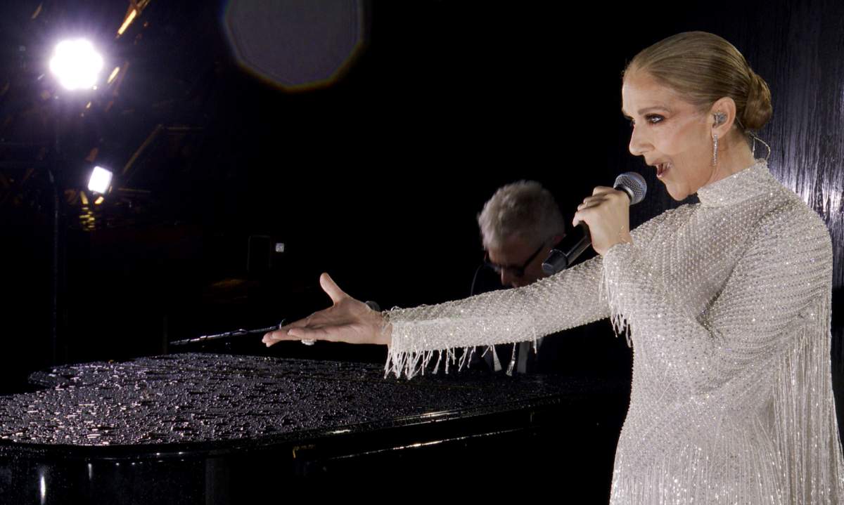 PARIS, FRANCE – JULY 26: (EDITOR’S NOTE: This Handout screengrab was provided by a third-party organization and may not adhere to Getty Images’ editorial policy.) This handout released by the Olympic Broadcasting Services, shows a view of singer Celine Dion performing on the Eiffel Tower during the opening ceremony of the Paris 2024 Olympic Games Paris 2024 on July 26, 2024 in Paris, France. (Screengrab by IOC via Getty Images)