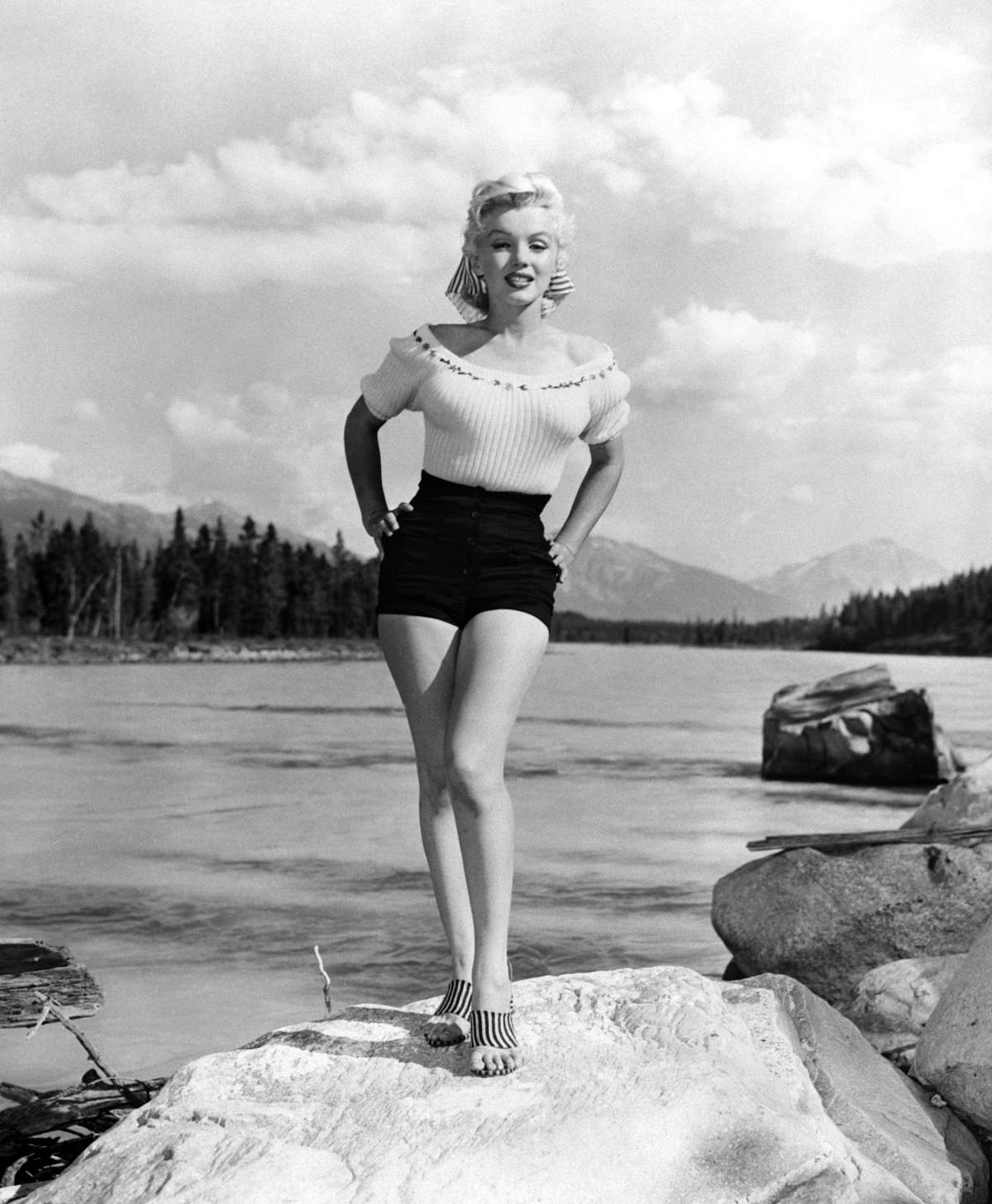 The beauty of Marilyn Monroe vies with the natural beauty of Jasper National Park, Alberta, Canada on October 17, 1953.