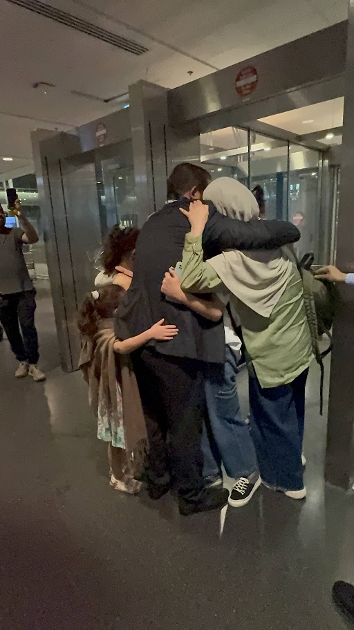 Zakaria Helles reunited with his wife and five children at Jean Lesage airport on June 24.