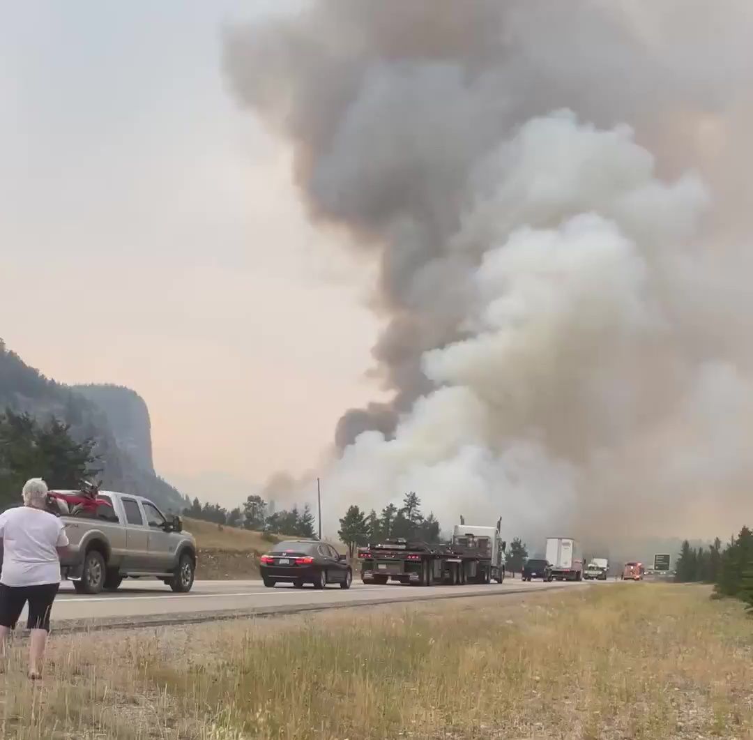 A line of vehicles waiting to leave the Jasper townside as Jasper National Park is evacuated due to wildfire on Monday, July 22, 2024.