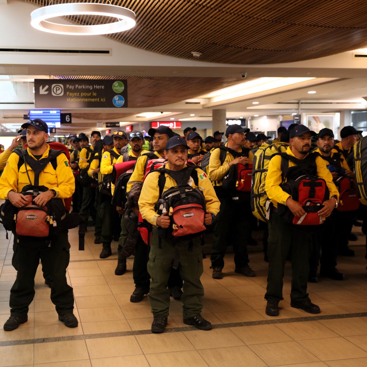 On Thursday, 100 firefighters from Mexico arrived in Edmonton to aid Alberta's wildfire response.