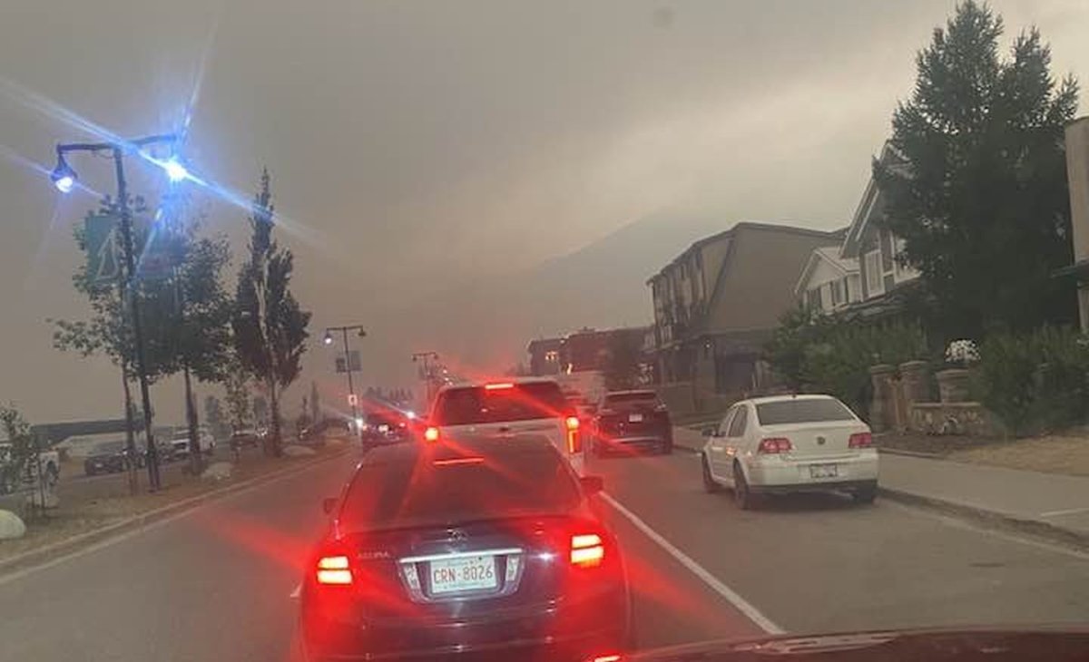 A line of vehicles waiting to leave the Jasper townside as Jasper National Park is evacuated due to wildfire on Monday, July 22, 2024.