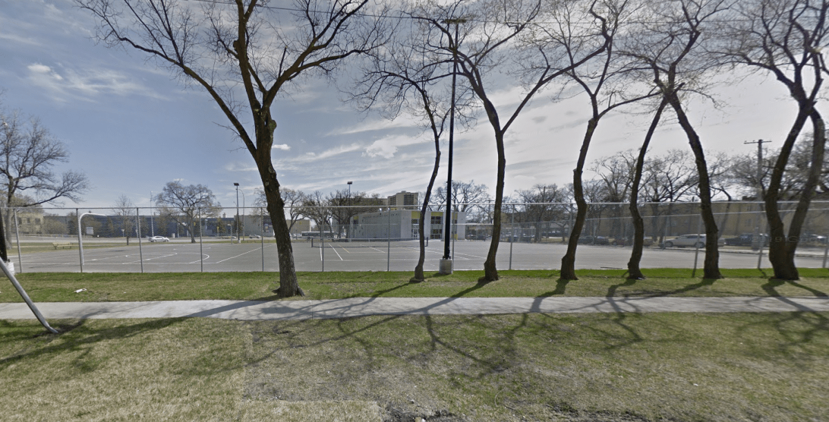 Before photo of the basketball court on River Ave, in Winnipeg.