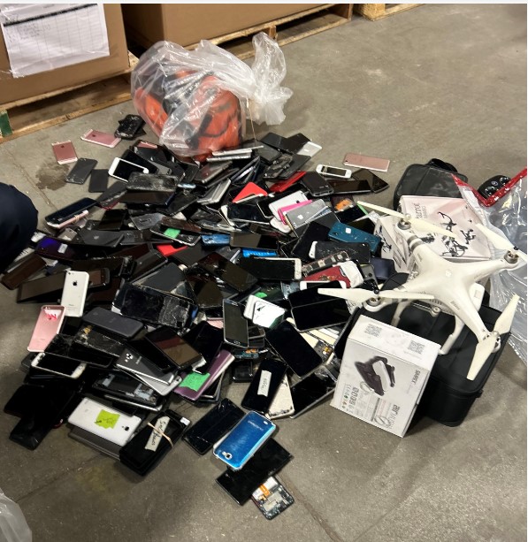 Photo of stolen electronics recovered by Winnipeg police after raid on June 26, 2024