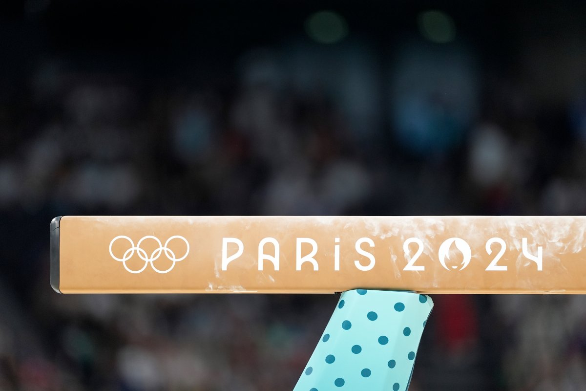 The Olympic logo is shown on the balance beam during a women's artistic gymnastics qualification round at the 2024 Summer Olympics, Sunday, July 28, 2024, in Paris, France. 