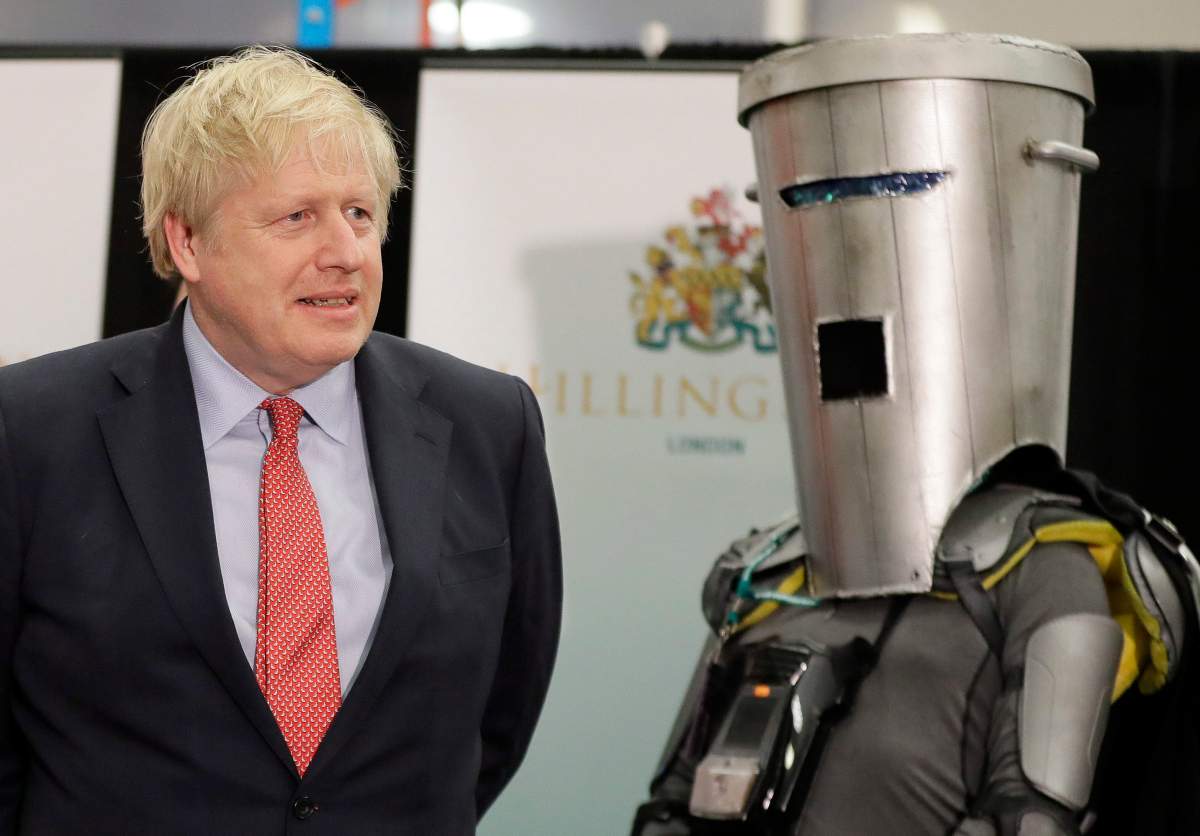 Count Binface poses beside former British prime minister Boris Johnson