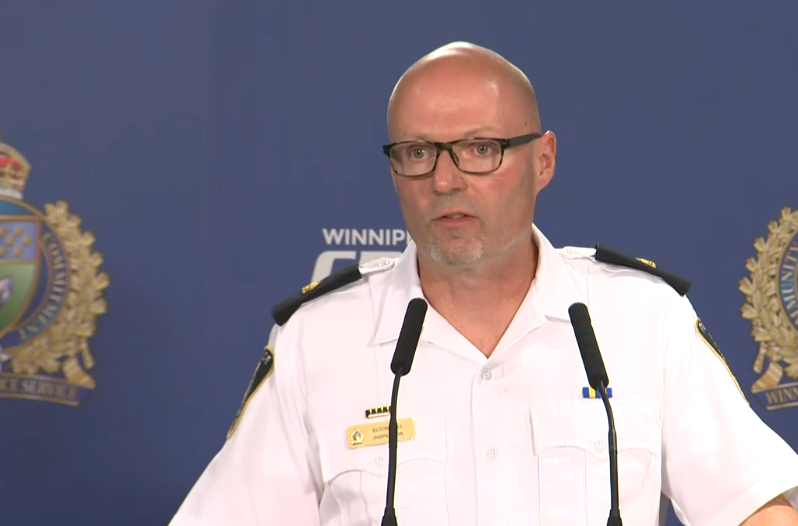 Winnipeg police Insp. Elton Hall speaks to media from police headquarters July 23.