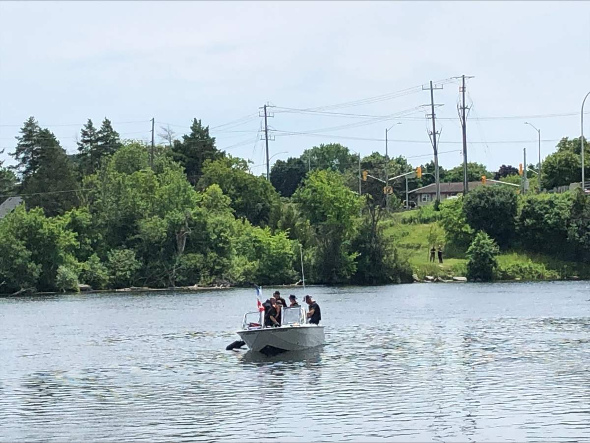 Emergency crews search the Otonabee River on July 2, 2024, after ending a search on July 1 due to darkness.