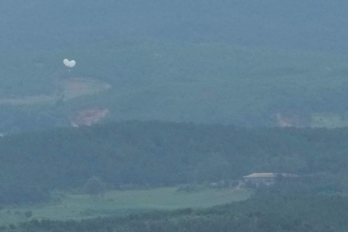 North Korean balloons are seen from the Unification Observation Post in Paju, South Korea, near the border with North Korea, South Korea, Wednesday, July 24, 2024.