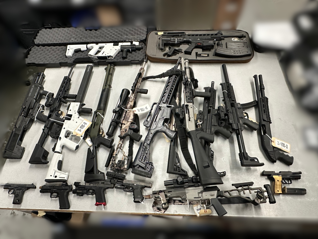 A photo of the 20 guns seized by police in Victoria.