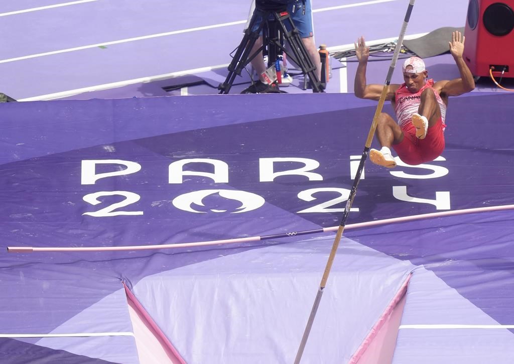 Canada's Damian Warner knocks the bar down as he competes in the men's pole vault in Decathlon at the 2024 Paris Summer Olympics in Paris, France on Saturday, August 3, 2024. THE CANADIAN PRESS/Nathan Denette.