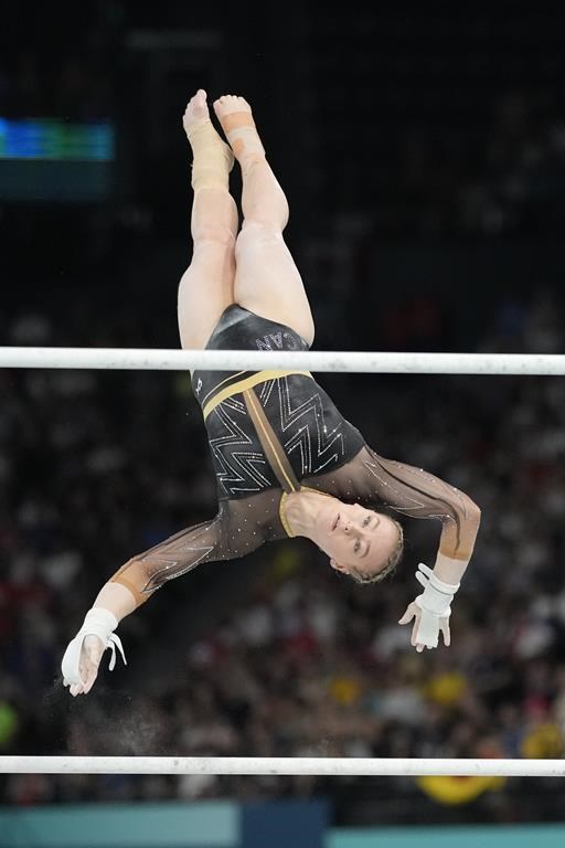 <p>Elsabeth Black, of Canada, performs on the uneven bars during the women's artistic gymnastics all-around finals in Bercy Arena at the 2024 Summer Olympics<i>, in Paris, France</i>, Thursday, Aug. 1, 2024. THE CANADIAN PRESS/AP-Natacha Pisarenko</p>.