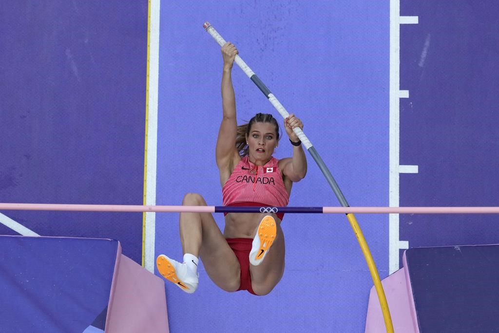 Alysha Newman, of Canada, competes in the women's pole vault qualification at the 2024 Summer Olympics, Monday, Aug. 5, 2024, in Saint-Denis, France. (AP Photo/David J. Phillip).