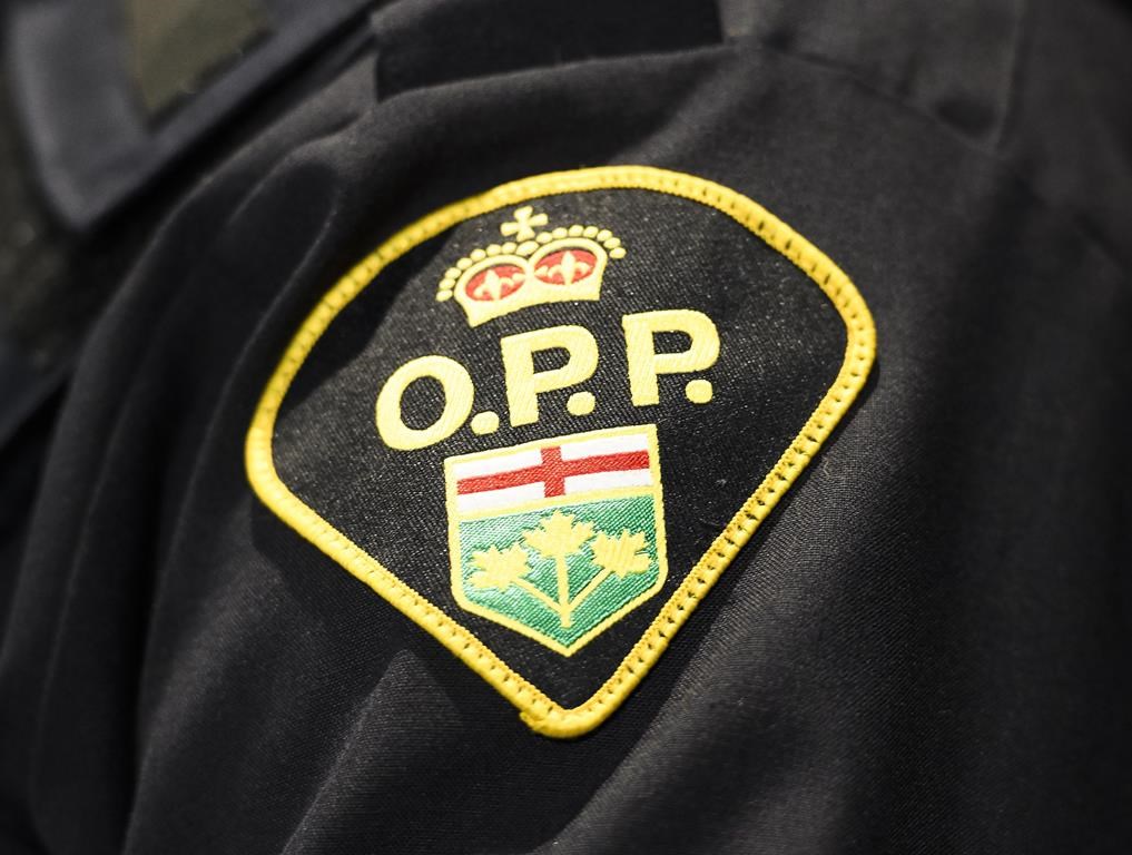 An 18-month-old child was found sitting on a passenger's lap in the front seat when police stopped a vehicle for speeding on Highway 417 in Ottawa over the long weekend.An Ontario Provincial Police logo is shown during a press conference in Barrie, Ont., on April 3, 2019.THE CANADIAN PRESS/Nathan Denette.