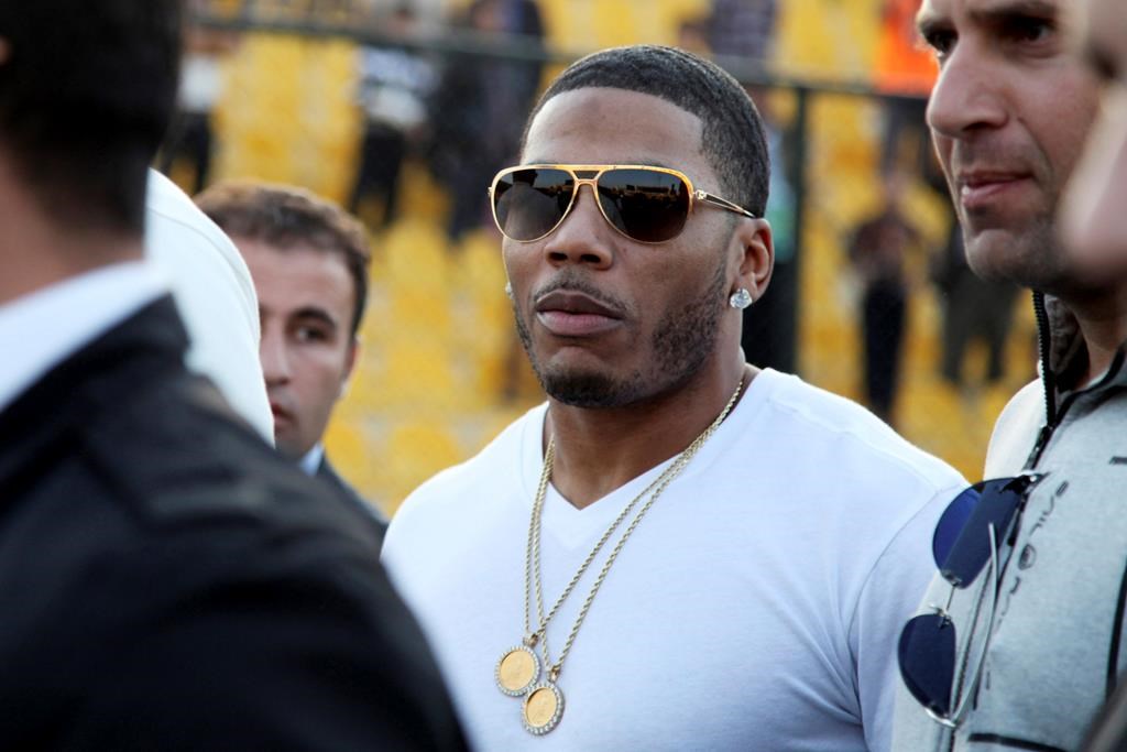 Rapper Nelly approaches the stage for a concert in Erbil, northern Iraq, March 13, 2015