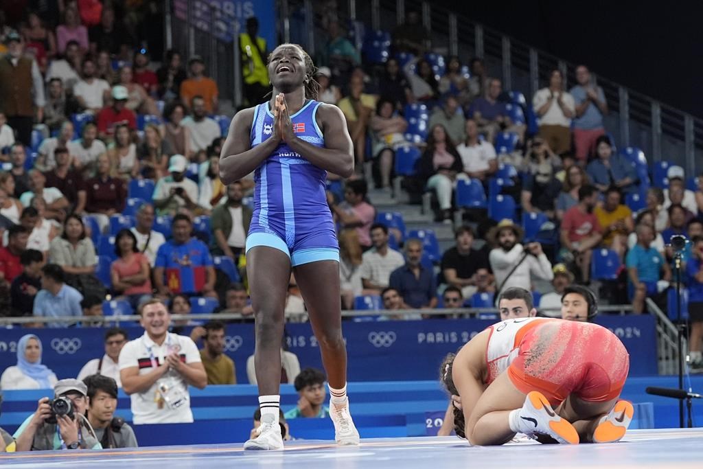 Norway's Grace Jacob Bullen celebrates after defeating Canada's Ana Paula Godinez Gonzalez in their women's freestyle 62kg bronze medal wrestling match, at Champ-de-Mars Arena, during the 2024 Summer Olympics, Saturday, Aug. 10, 2024, in Paris, France. THE CANADIAN PRESS/AP-Eugene Hoshiko.