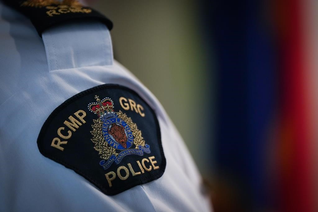 An RCMP patch is seen during a news conference. THE CANADIAN PRESS/Darryl Dyck.