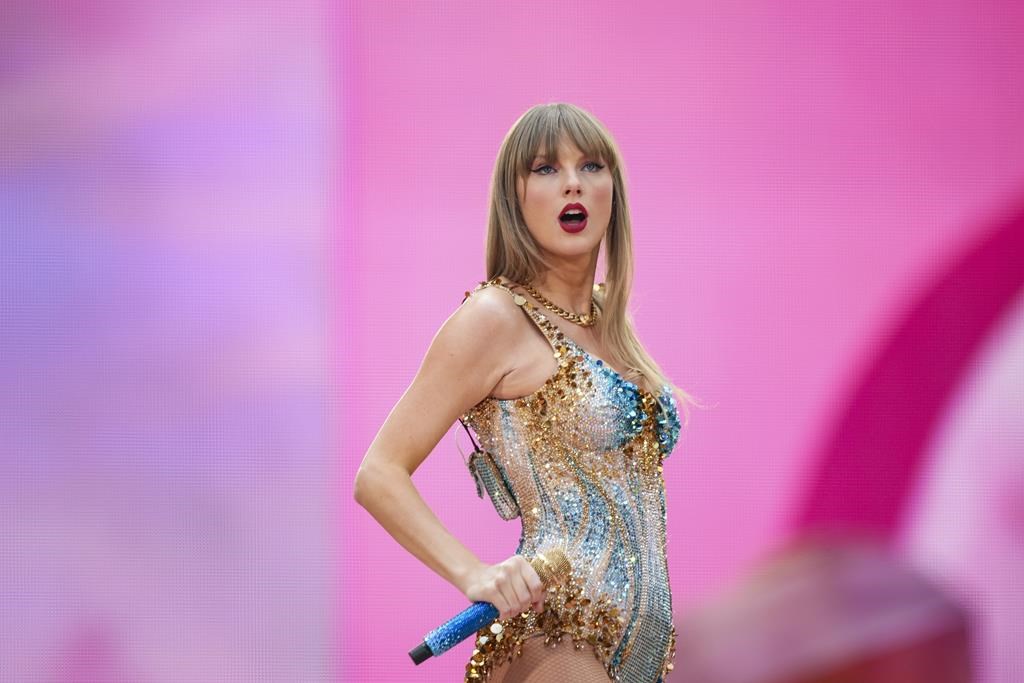 FILE - Taylor Swift performs at Wembley Stadium as part of her Eras Tour, June 21, 2024, in London. (Photo by Scott A Garfitt/Invision/AP, File).