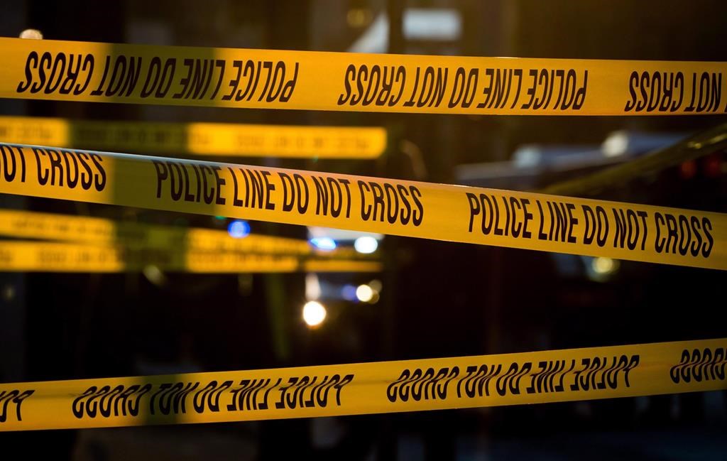 Police tape cordons off a crime scene in the Downtown Eastside of Vancouver, B.C., on April 9, 2015. 