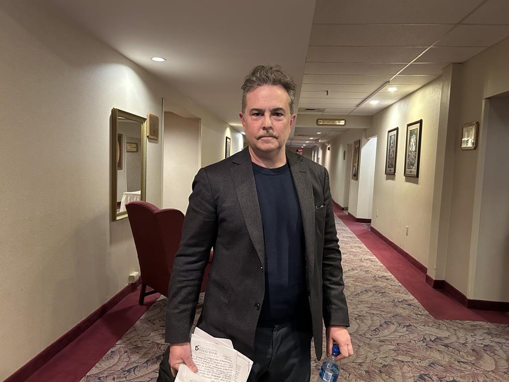 Ryan Mesheau, son of Darrell Mesheau, attends a coroner's inquest into his father's death in Fredericton on April 9, 2024. 