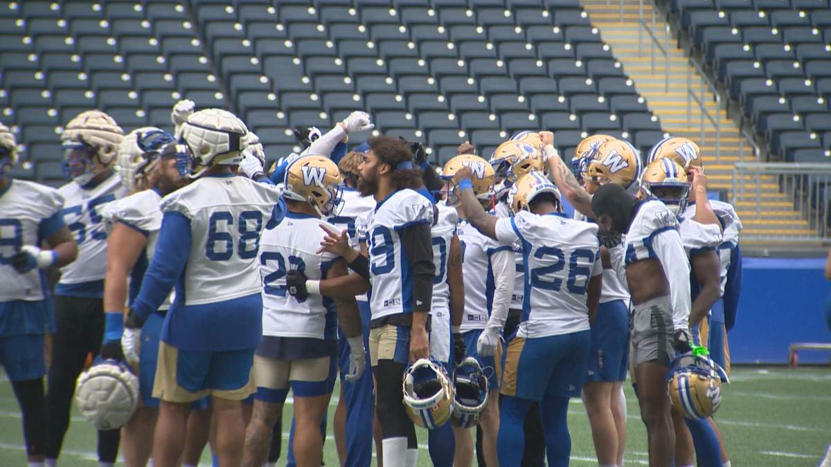 The Blue Bombers huddle during practice on Tuesday.