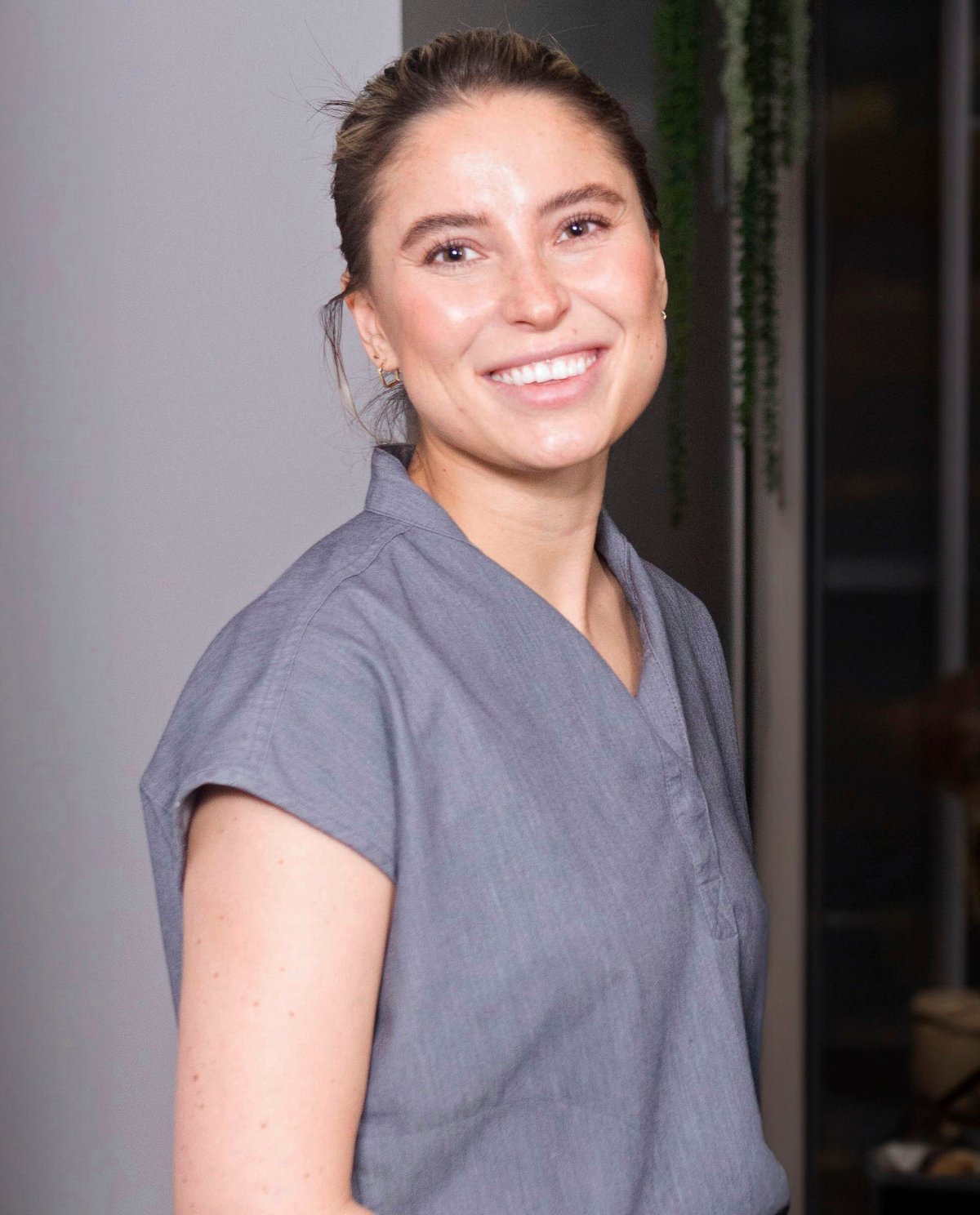 An undated photo of Los Angeles-based aesthetician Ksenia Khavana pictured in her medical scrubs.