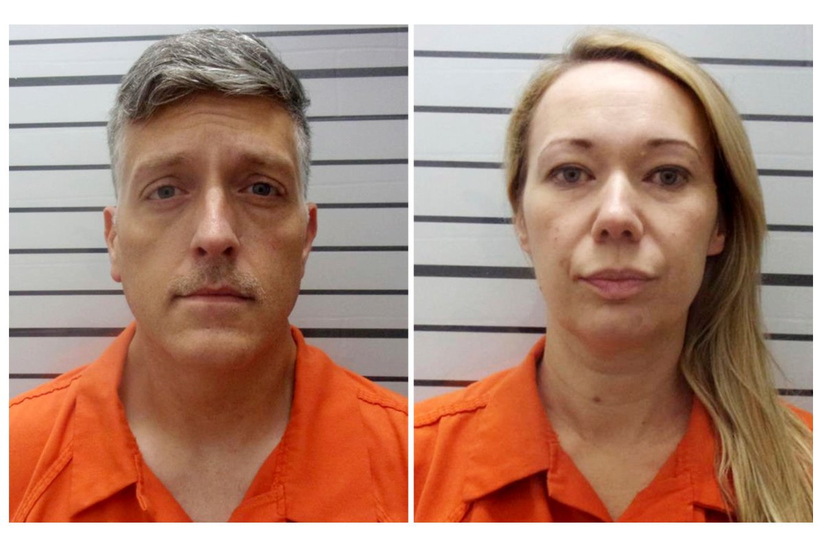 FILE - This combination of booking photos provided by the Muskogee County, Okla., Sheriff's Office shows Jon Hallford, left, and Carie Hallford, the owners of Return to Nature Funeral Home.